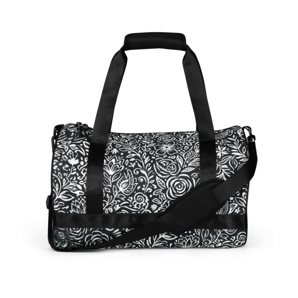 A seamless hand-drawn pattern of white chalk-style roses and botanical vines on a black background.