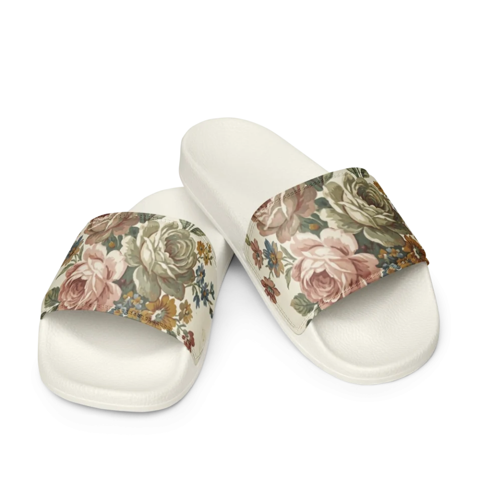 Vintage floral pattern with dusty pink roses and sage green leaves on a cream background.