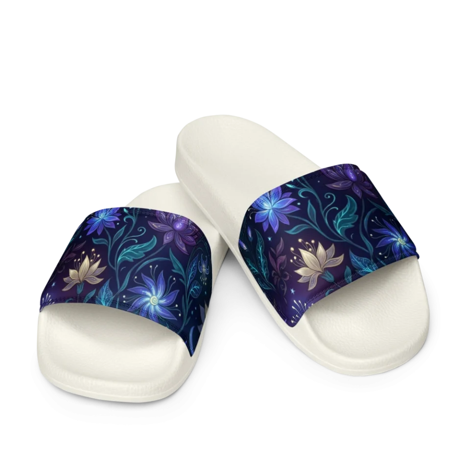 Luminous blue and purple fantasy flowers with crescent moons on a dark background.