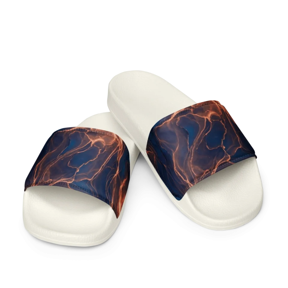 Abstract pattern of swirling metallic copper alcohol ink on a deep navy blue background.